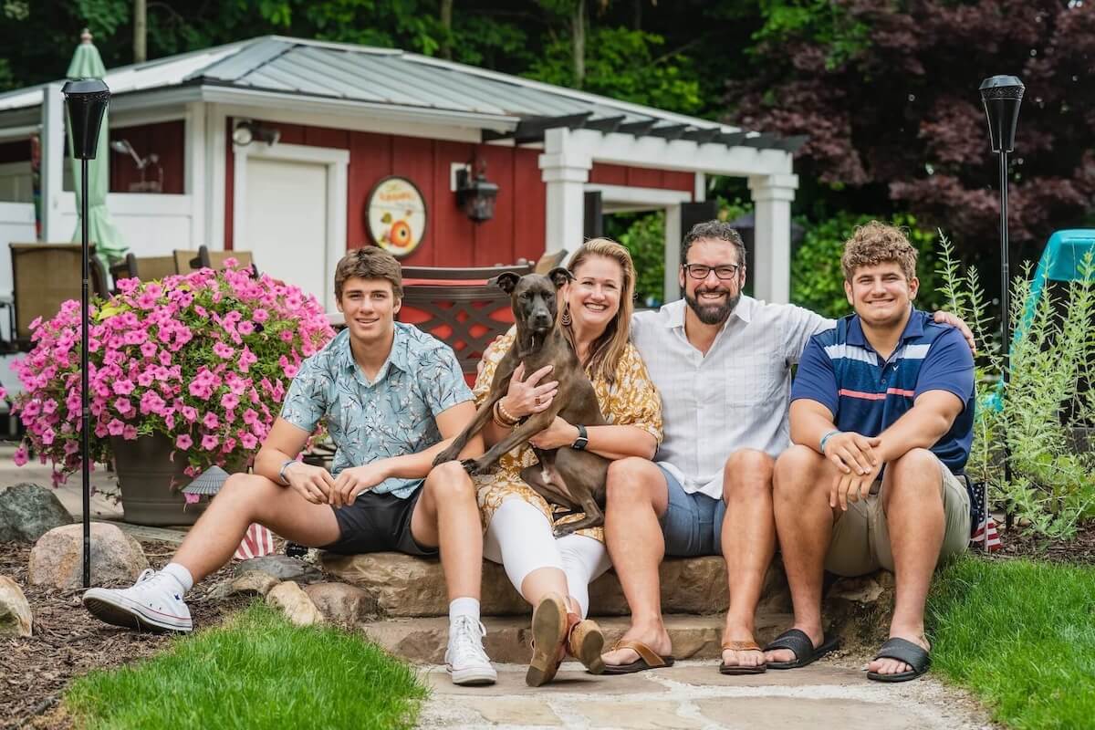 Author Carla M. Flanders and family with dog Griff