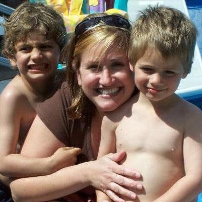 Author Carla M. Flanders and boys at the pool